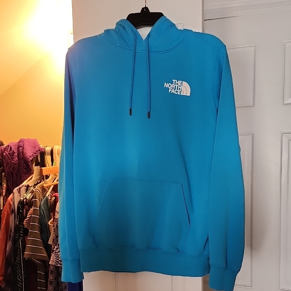 The North Face Blue Hoodie with Classic Design and Ribbed Cuffs